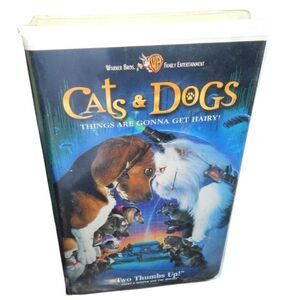 CATS & DOGS vintage VHS movie in original plastic clamshell case